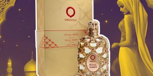 Perfume Royal Amber de Orientica e sua caixa, com um fundo dourado árabe, com uma mulher à direita