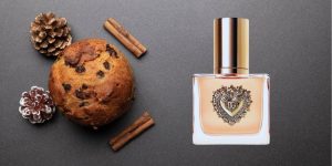 Devotion, perfume da Dolce & Gabanna, ao lado de um Panetone