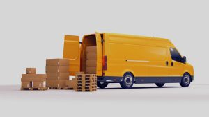Parte traseira de uma van de entregas aberta com várias caixas de papelão por perto